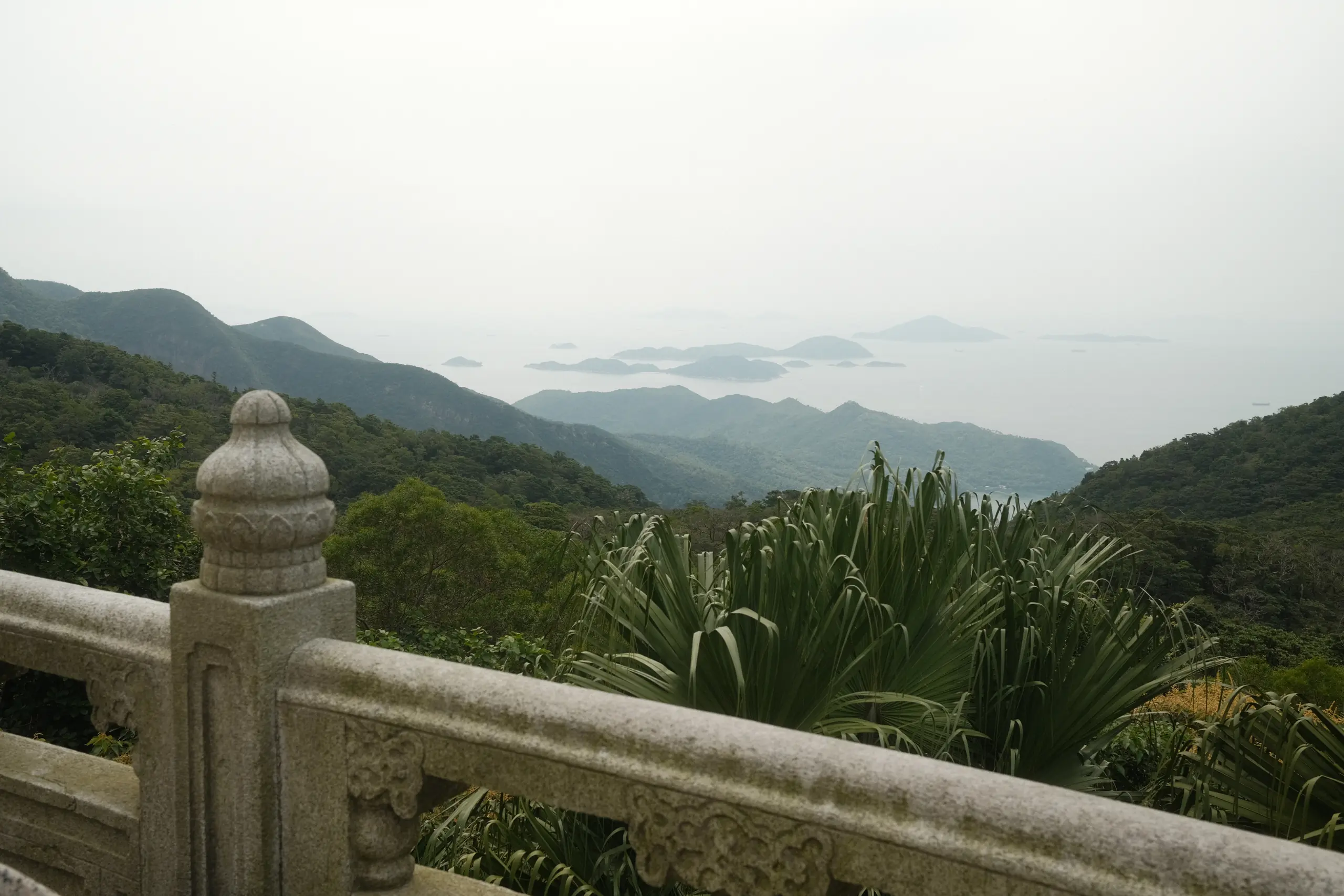 Green hills and the sea seen from Ngong Ping