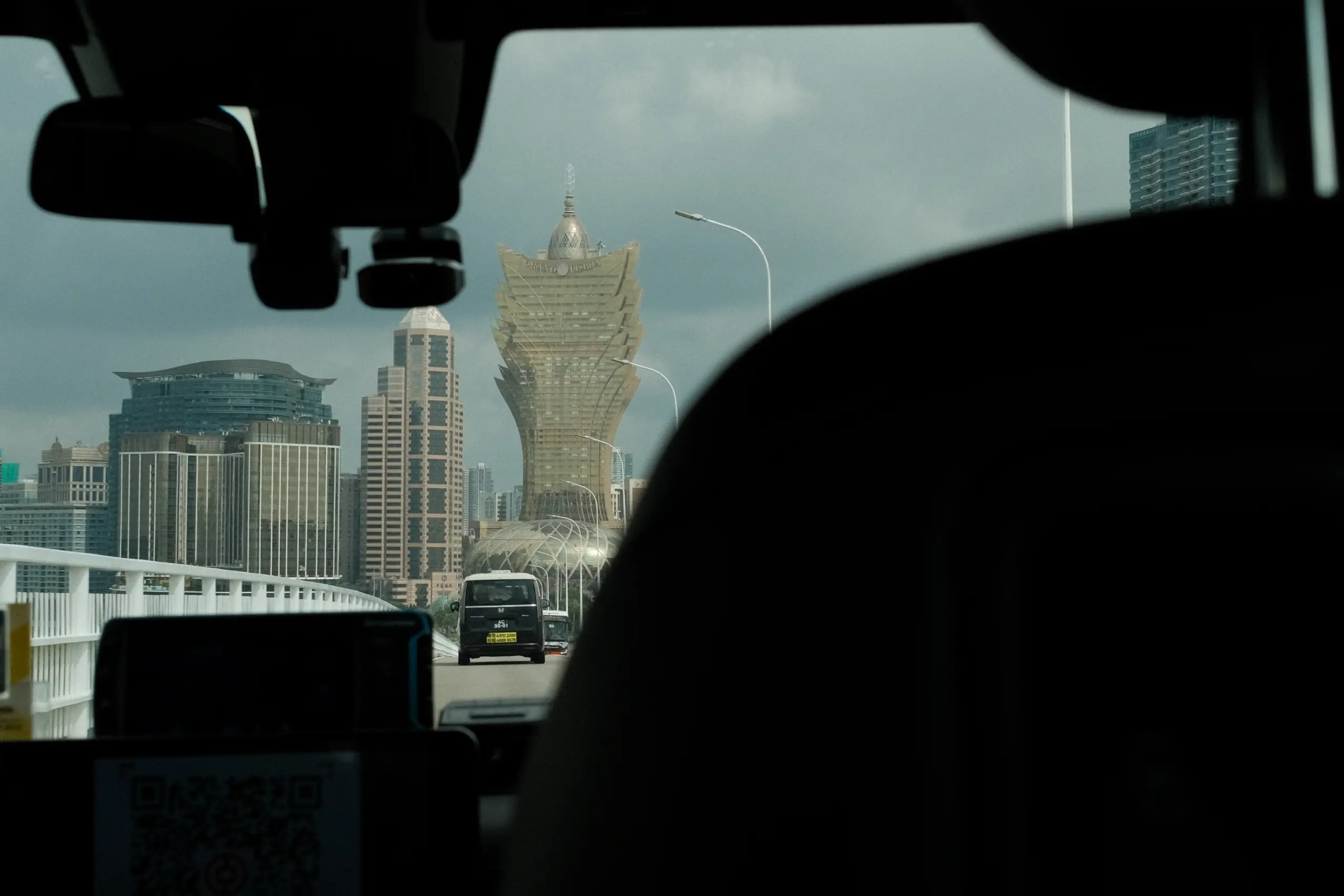 The Grand Lisboa seen through a taxi windscreen