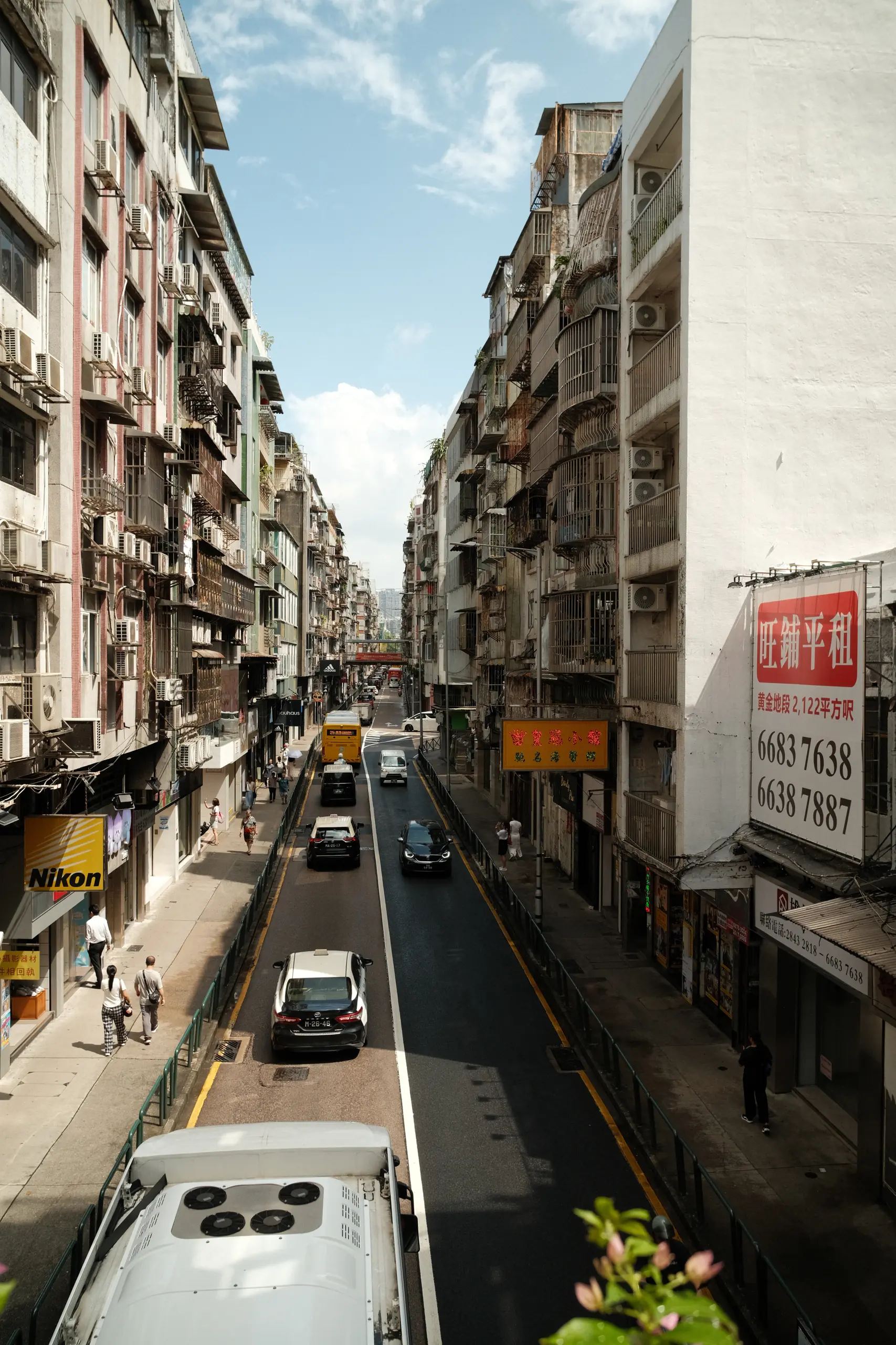 A narrow residential street in Macau seen from above