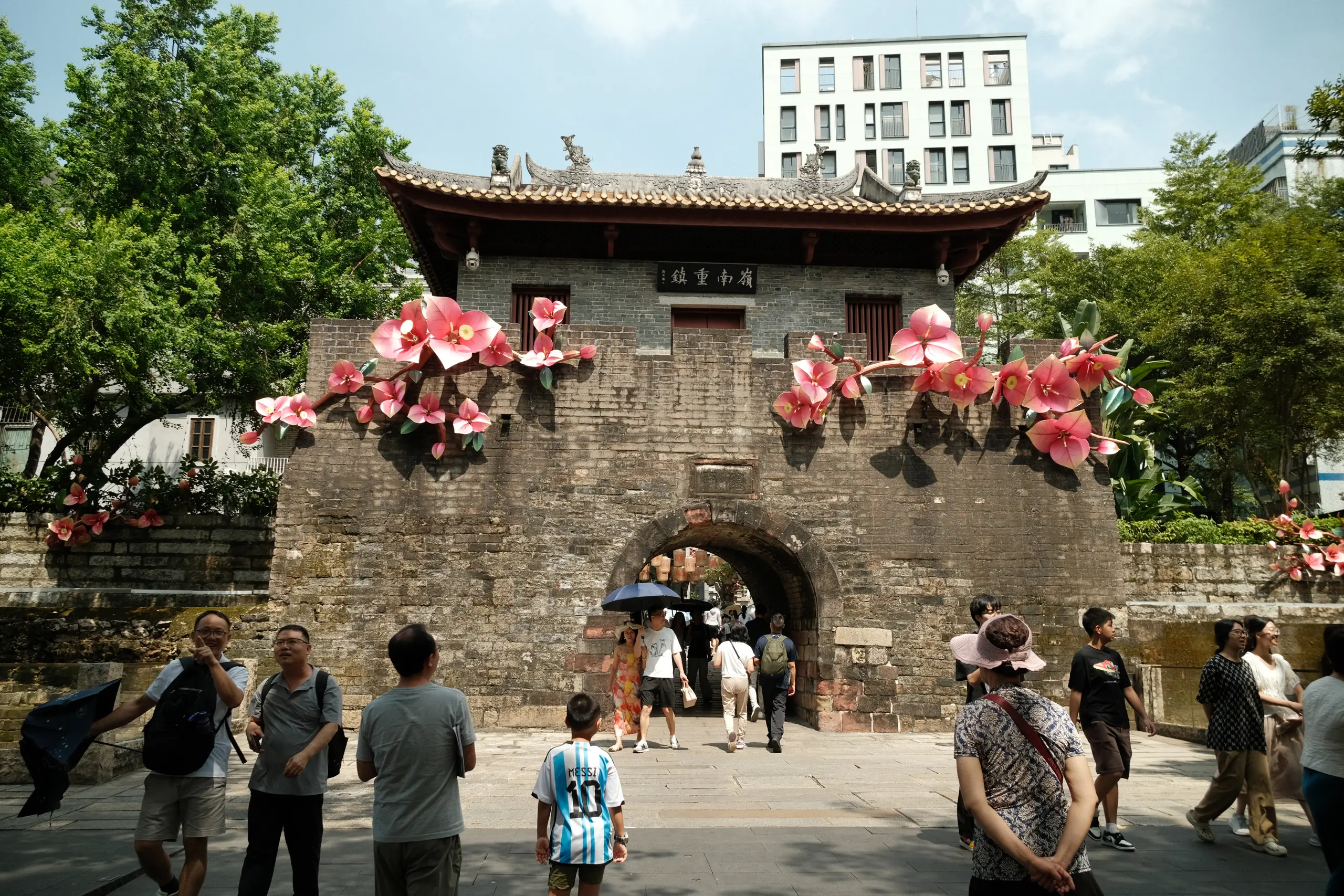 The stone gate of Nantou Ancient City decorated with flowers