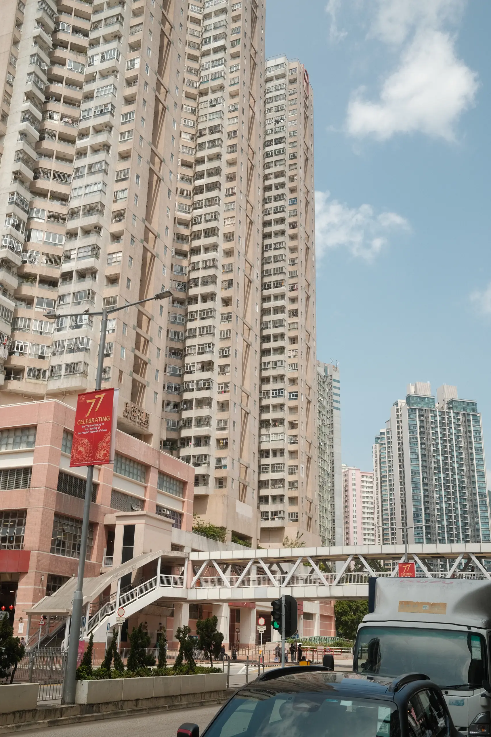 Housing towers against a blue sky
